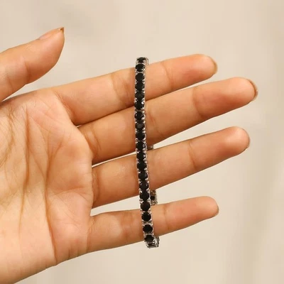 Brazalete de tenis de 8" de diamantes negros de corte redondo de 8 quilates de oro blanco de 14 quilates Foto 1 de 4