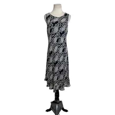 Vestido midi sin mangas forrado floral seda negro Shomi talla 10 Foto 1 de 4