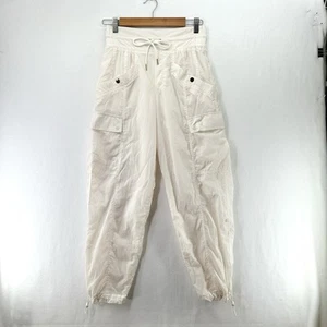 Pantalones deportivos Athleta para mujer 4 marfil Alicia Keys carga paracaídas ropa deportiva - Imagen 1 de 15