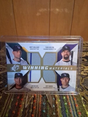 Matt Holliday Todd Helton Jayson Nix Jeff Baker 2009 Upper Deck SPX Quad Relic - Image 1 of 2