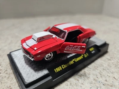 Chevrolet Camaro ZL1 1969 Coca Cola 1:64 Die-Cast Car M2 Machines Foto 1 de 4
