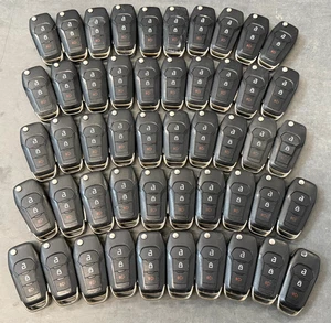 LOTE DE 50 LLAVEROS ABATIBLES FORD USADOS OEM LOTE LLAVERO ENTRADA SIN LLAVE N5F-A08TAA - Imagen 1 de 7