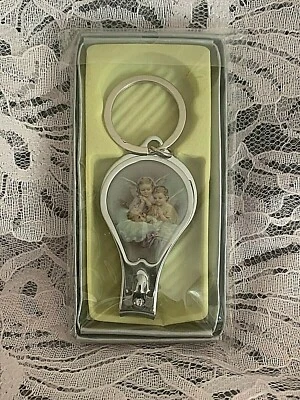 Favores de bautizo/baby shower - Llavero clip para uñas - bebé con ángeles de la guarda Nuevo en caja  Foto 1 de 3