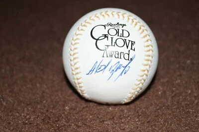 2 件银色 SLUGGER AS GG ALEXEI RAMIREZ 签名 OML GG 棒球 — 第 1/2 张图片