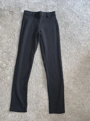 Pantalones negros elásticos regulares para niñas talla 12 Foto 1 de 3