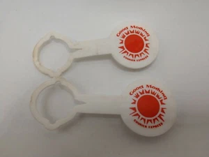 Vintage Pair of Good Morning Currier Express Plastic Orange & White Bottle Caps - Picture 1 of 4