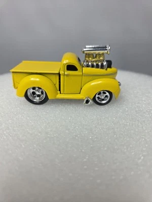 Muscle Machines 1940 Willys Pickup Truck Yellow Diecast 1:64 Scale - Image 1 of 4