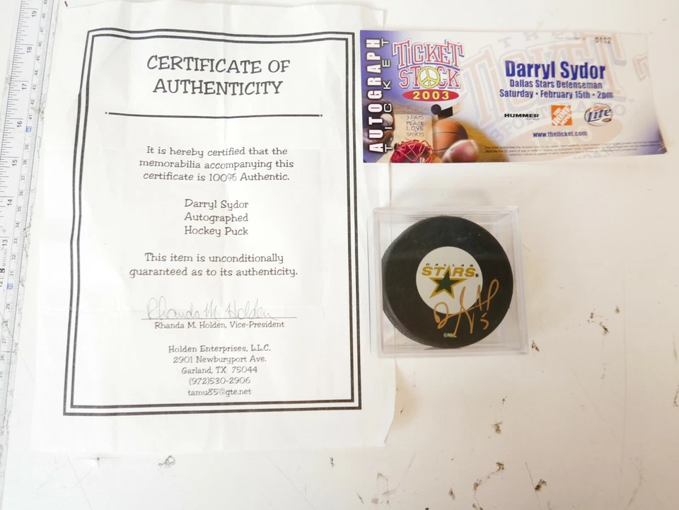 Disco de hockey firmado por Darryl Sydor NHL Dallas Stars automático con certificado de autenticidad y boleto 2003 Foto 1 de 4