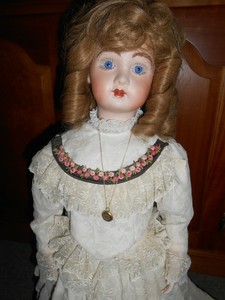 porcelain dolls on stands