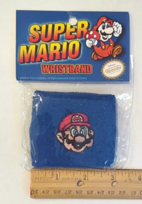 SUPER MARIO Bros. BLUE WRISTBAND NINTENDO 2004 ARCADE RETRO GAMER NEW OLD STOCK - Image 1 of 3
