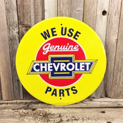 Chevrolet We Use Chevy Parts Round Yellow Metal Tin Sign 12" Garage Man Cave - Image 1 of 2