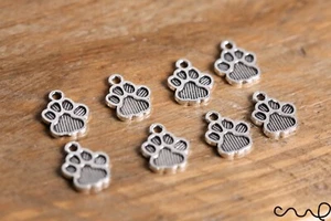 8 x Silver Dog Paw Metal Charms Small Jewellery Making Craft Double Sided - Picture 1 of 6