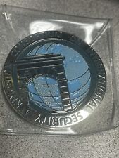 The Kingston Consortium on International Security (KCIS) commemorative coin .06g