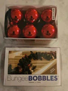 2 Boxen 12 rote Bungee Bommeln Kugel Girlande Verschlüsse schnell Weihnachtsdeko - Bild 1 von 4