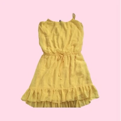 Vestido Bebe amarillo brillante con pajarita Foto 1 de 4
