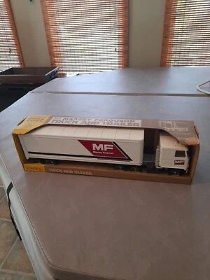 VINTAGE ERTL MASSEY FERGUSON TRACTOR TRUCK AND TRAILER, NEW IN BOX, RARE !!! - Image 1 of 4