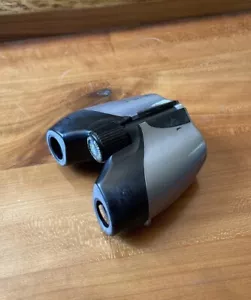 Buschnell compact binocular 7x21 FOV 340ft at 1000 YDS. 13-0721 - Picture 1 of 7