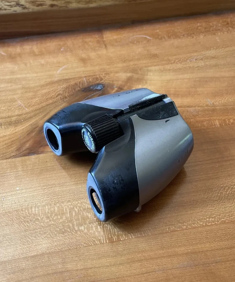 Buschnell compact binocular 7x21 FOV 340ft at 1000 YDS. 13-0721 - Image 1 of 4