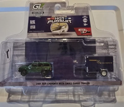 CHASE 2001 Jeep Cherokee w/ Trailer – New York 1 64 Scale Model - Greenlight - Image 1 of 2