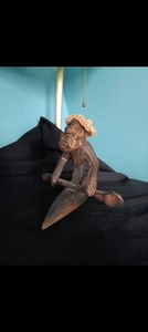 Vintage Wood Tiki Man Figurine In Kayak canoe Hand Carved Burlap Hair & Attire - Picture 1 of 8