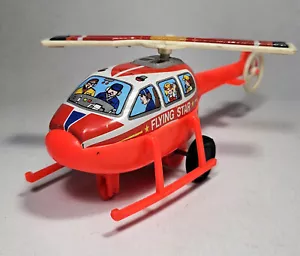 JIMMY TOYS 80's 7'' RED FLYING STAR HELICOPTER TIN & PLASTIC w/ SPINNING BLADES - Picture 1 of 12