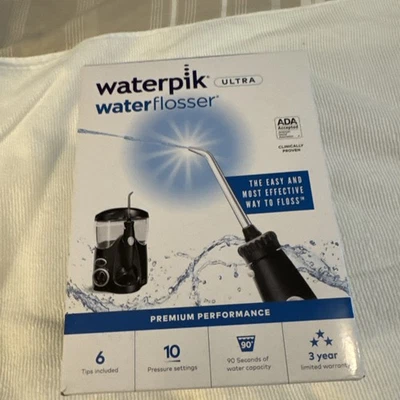 Waterpik Ultra Water Flosser con 10 ajustes de presión + 7 puntas, sellado Foto 1 de 4