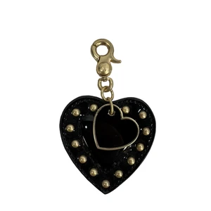 Portachiavi da appendere cuore borchiato nero e oro Mulberry per bersaglio - Foto 1 di 6