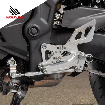 Reposapiés ajustable WOLFLINE juegos traseros para Yamaha YZF R 3 MT 03 25 16-23 Foto 1 de 4