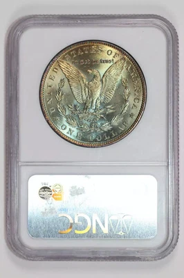 1886 MORGAN DOLLAR NGC MS67 GORGEOUS REVERSE RAINBOW TONING! - Image 1 of 2
