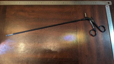 AGARRADOR LAPAROSCÓPICO SIN MARCA Foto 1 de 3