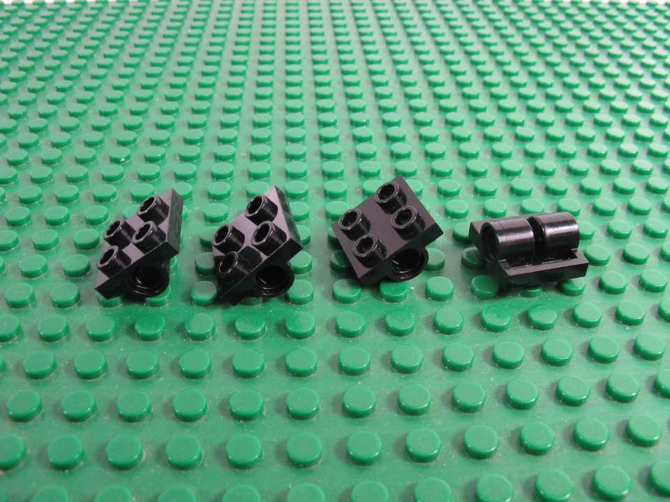 4x LEGO Placa Negra Modificada 2 x 2 con Agujeros de Doble Pin Soporte de Rueda de Vehículo #2817 Foto 1 de 1