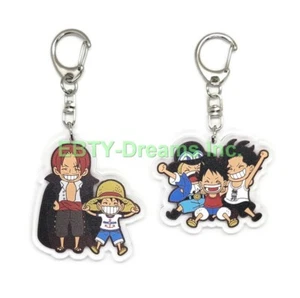 2er Set OVP Anime Acryl Schlüsselanhänger Portgas D. Ace, Sabo, Monkey D. Luffy, Shanks - Bild 1 von 2