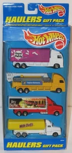 1997 Hot Wheels Four Haulers Geschenkpackung, enthält McDonalds & Milk Duds - Neu im Karton! - Bild 1 von 2