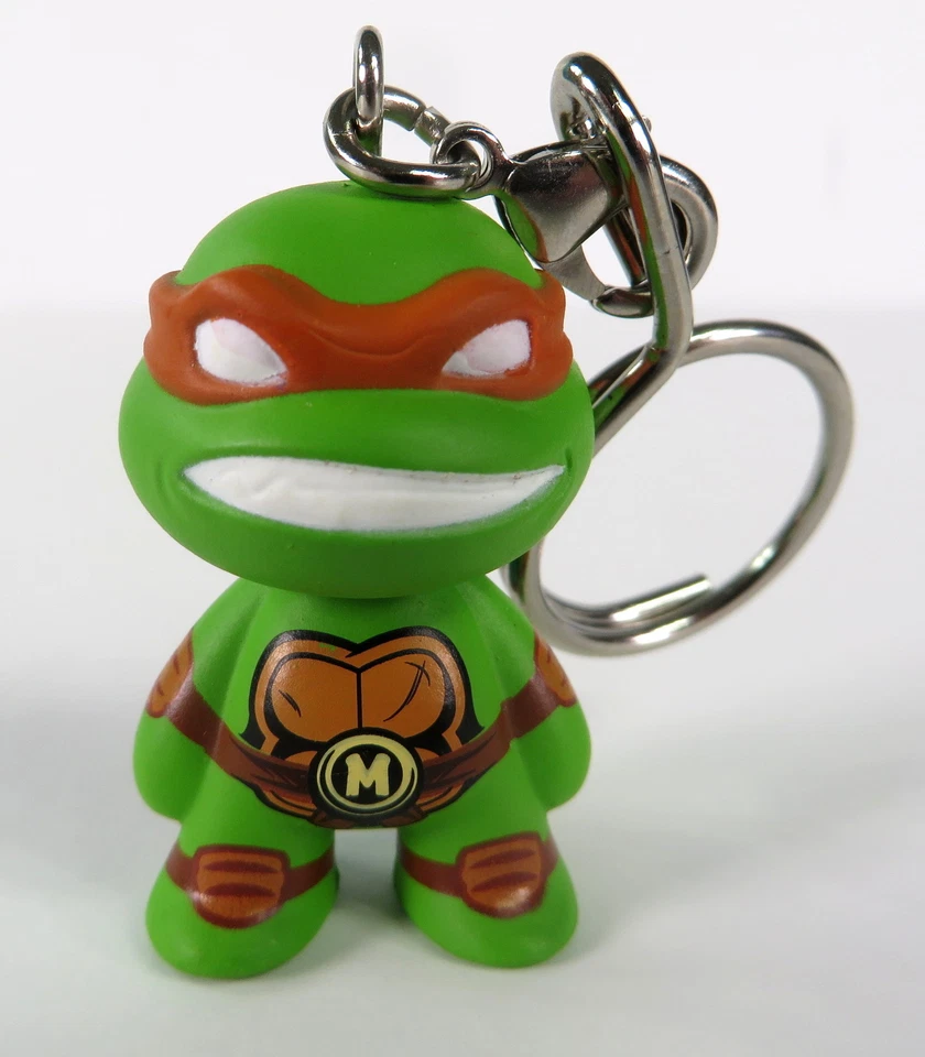 Kidrobot TMNT Shell Shock Vinilo Llavero Serie Miguel Ángel Figura NUEVO Foto 1 de 1