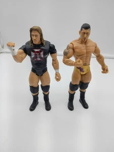 LOTE DE FIGURAS DE LUCHA LIBRE JAKKS WWE ADRENALINE SERIE 12 BATISTA Y TRIPLE H Completo  - Imagen 1 de 5