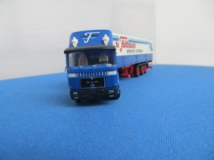 Herpa 1/87 MAN Sattelzug W. Flöttmann Spedition Gütersloh in OVP - Bild 1 von 7