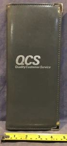 QCS Qualität Kundenservice grauer Ordner mit Amoco Visitenkarten - Bild 1 von 7