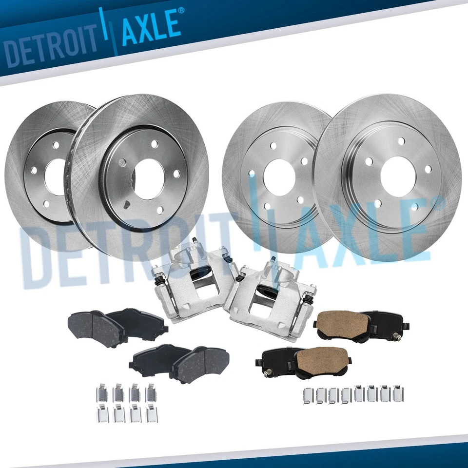 Rotores de disco delanteros traseros pastillas de freno pinzas para Town and Country Grand Caravan Foto 1 de 4