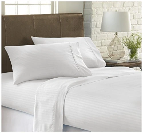 . Case of 12 Twin Premium Embossed Stripe 3 Piece Sheet Set - White .