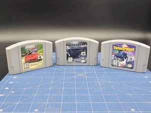 Nintendo 64 Game Lot Of 3 Games TETRISPHERE, FORSAKEN 64 & CRUISING USA - Picture 1 of 8