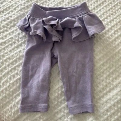 Pantalones morados recién nacidos Okie Dokie bebé niña súper lindos y elásticos Foto 1 de 3