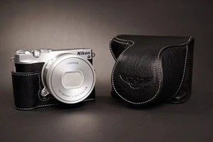 Funda completa de cuero genuino para cámara para lente Nikon J5 10-30 mm negra - Imagen 1 de 10