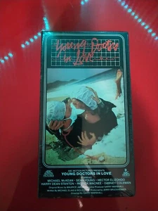YOUNG DOCTORS IN LOVE (VHS, 1982) MICHAEL MCKEAN, SEAN YOUNG, NEW & SEALED - Picture 1 of 3