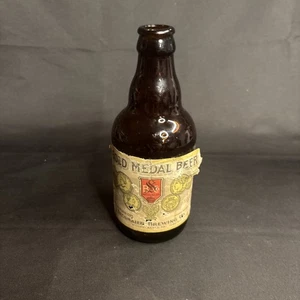 STEGMAIER BREWING GOLD METAL BEER BOTTLE Vintage 1930 12oz - Picture 1 of 5