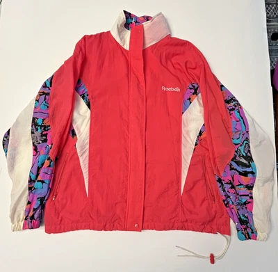 CHAQUETA CORTAVIENTOS REEBOK MEDIANA VINTAGE AÑOS 90 PARA MUJER CON CAPUCHA PLEGABLE ROSA Foto 1 de 4