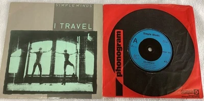 Two early Simple Minds 7” UK vinyl singles on Arista I Travel and Celebrate  - Image 1 of 4