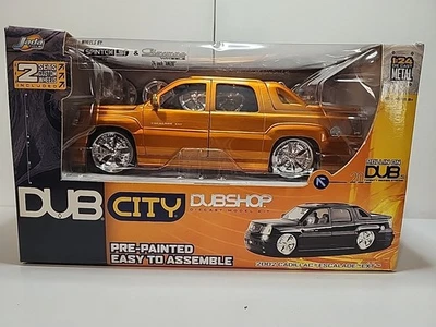 JADA DUBSHOP 2002 CADILLAC ESCALADE EXT  COPPER 1:24 DIECAST MODEL KIT - Image 1 of 4