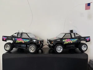 2x TYCO Mini Bandit RC Trucks - USA & Rare China Decal Variant + Remote- WORKING - Picture 1 of 17