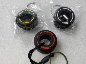 Pirelli P-Zero Racing Slick Tire Formula 1 Keychain White Red Yellow (3) NEW - Picture 1 of 6