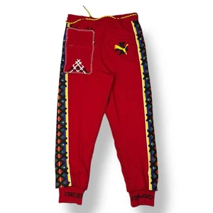 Pantalones deportivos Puma x Jahnkoy para hombre talla M bolso desmontable rojo - Imagen 1 de 7